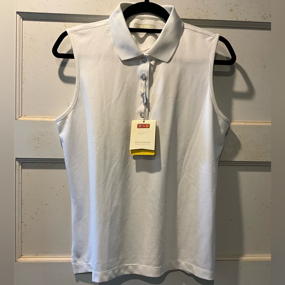 NWT Greg Norman “Play Dry” white, sleeveless top from Haggin Oaks Golf Complex